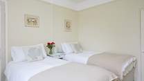 The pretty twin bedroom.
