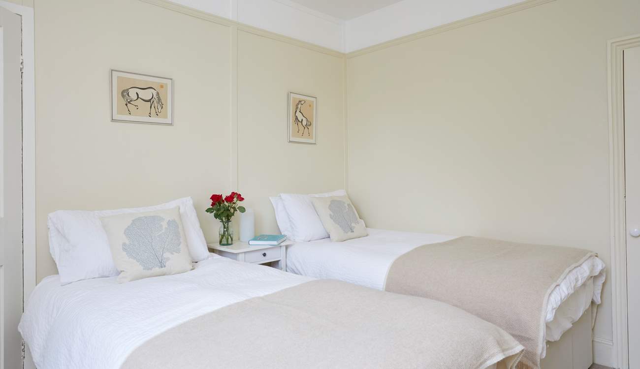 The pretty twin bedroom.