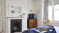 Bedroom 2 is a generous size with large windows facing the front of the property.