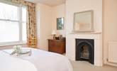 Spacious bedroom one with ornamental fireplace. - Thumbnail Image