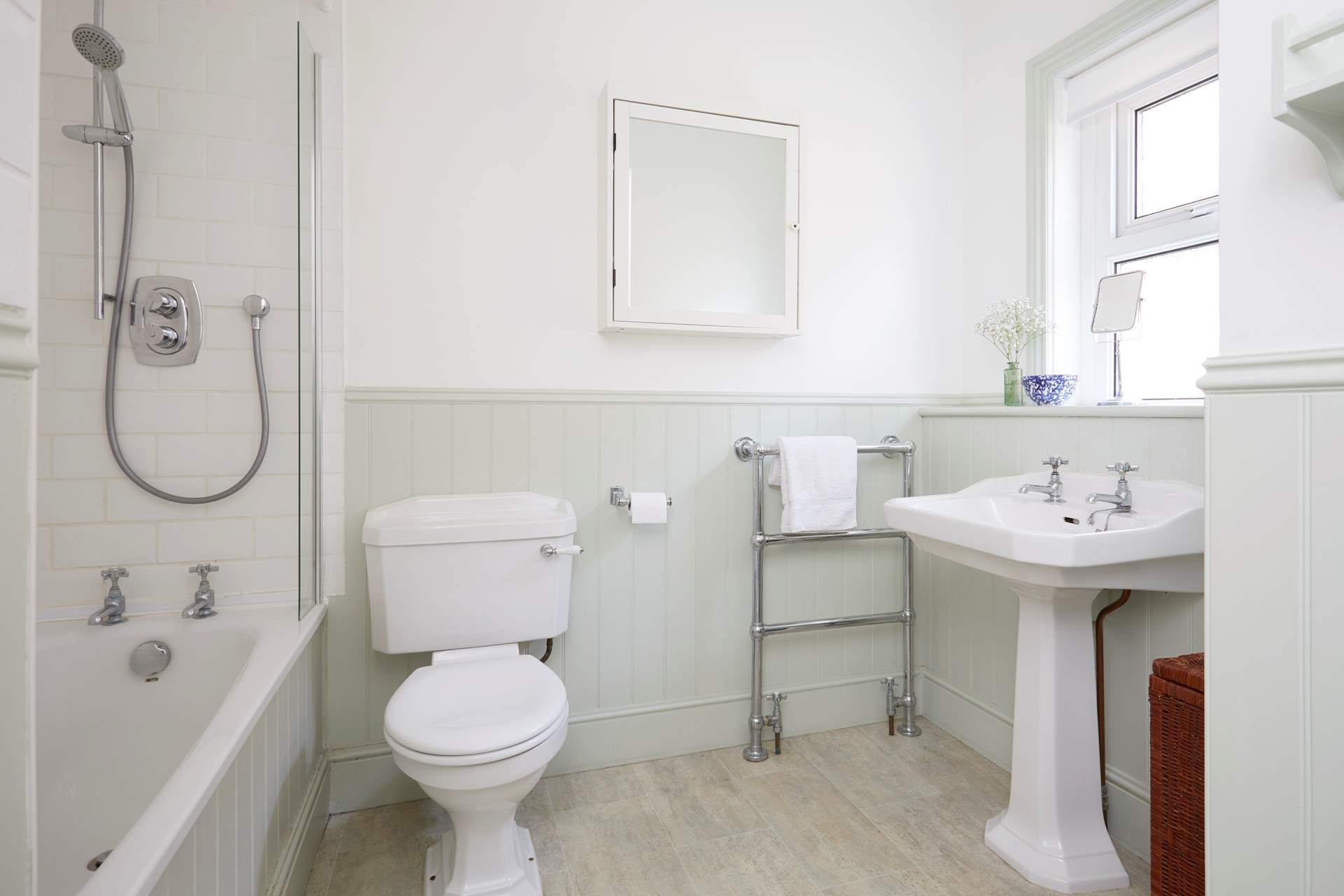 Timeless design in the lovely family bathroom.