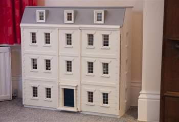 The adorable doll house in the twin bedroom.