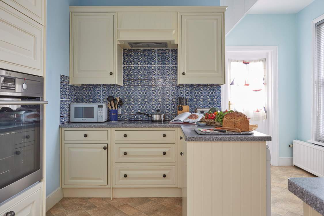 The bright and airy kitchen which leads to the rear garden.