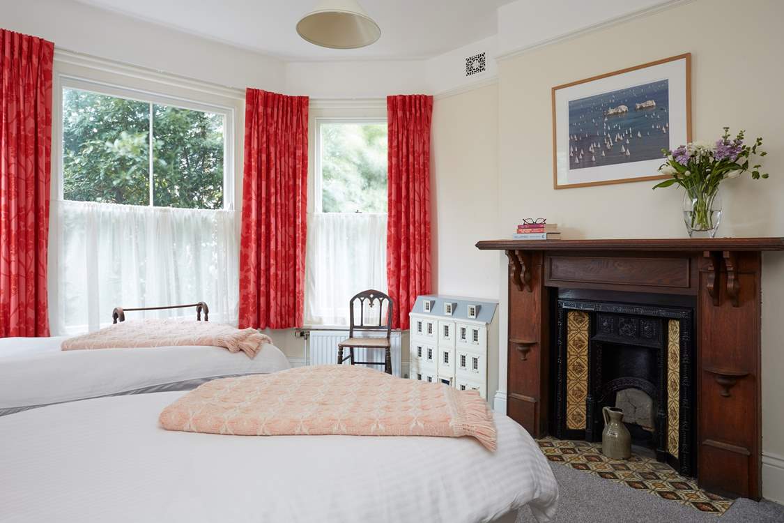 The twin bedroom with a Doll's House the youngsters will enjoy.