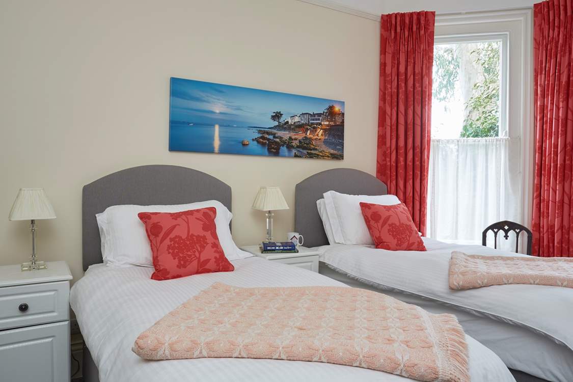 The spacious twin bedroom.