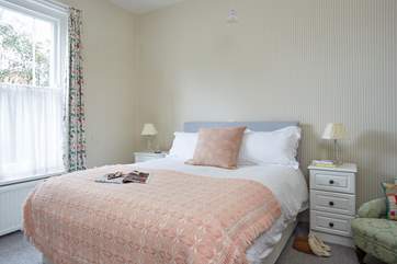 The bright middle bedroom.