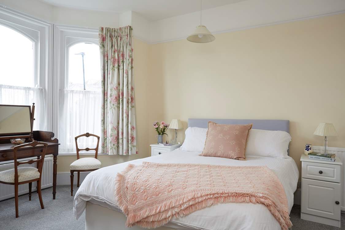 The large, comfortable main bedroom has sea views.