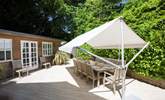 The parasol over the outside table is brilliant for eating in the shade and enjoying your chilled drink. - Thumbnail Image