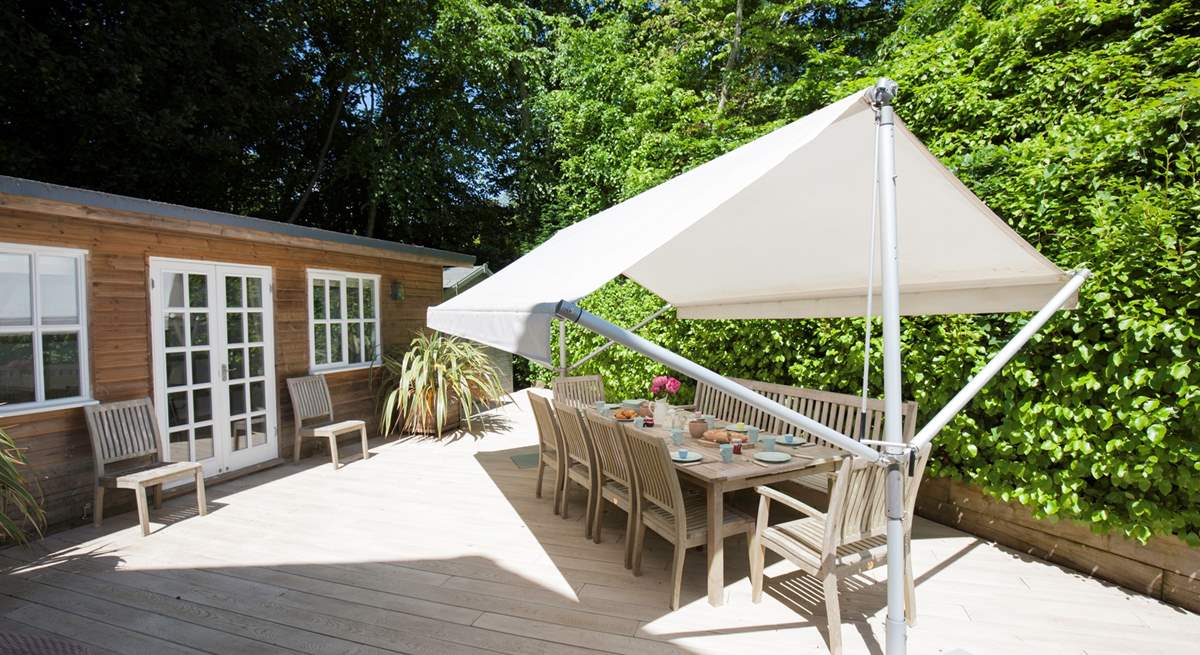 The parasol over the outside table is brilliant for eating in the shade and enjoying your chilled drink.