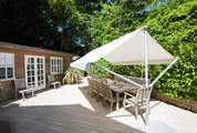 The parasol over the outside table is brilliant for eating in the shade and enjoying your chilled drink.