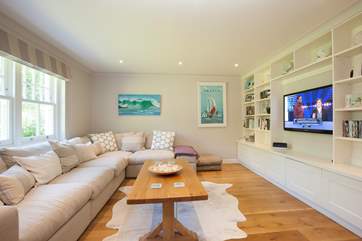 The sitting-room off the dining-room is a gorgeous and comfortable room to unwind, watch a spot of TV or relax to a favourite movie.