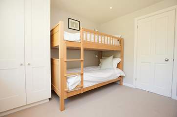 The bunk bedroom has two sets of bunk beds which are suitable for either children or adults in your party.