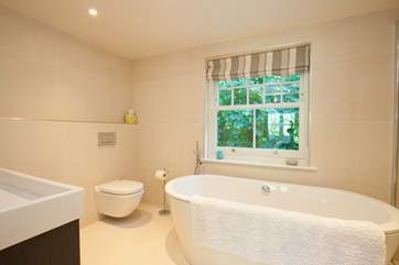 The elegant en suite off the master bedroom is a little piece of heaven when it comes to the ultimate relaxation.