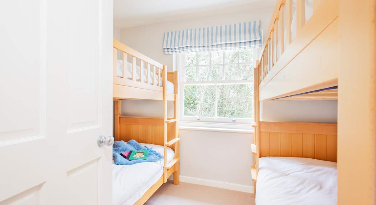 The twin bunk beds accommodate four, ideal for the children in your party.