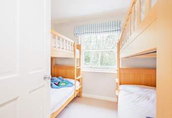 The twin bunk beds accommodate four, ideal for the children in your party.