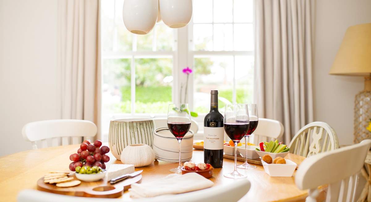 The circular table in the open plan kitchen/diner welcomes eight guests.