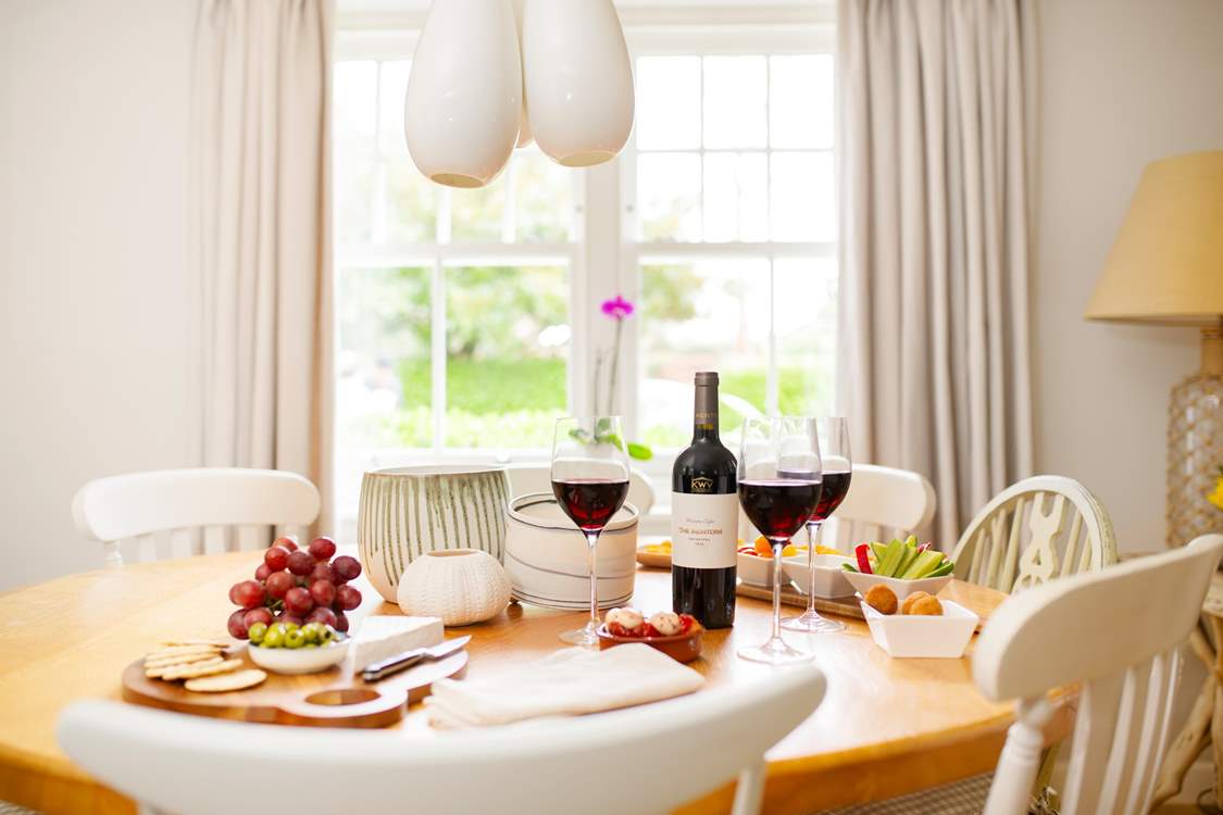 The circular table in the open plan kitchen/diner welcomes eight guests.
