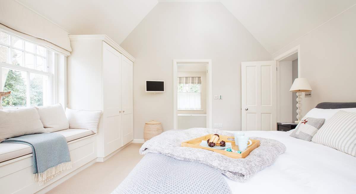 A view towards the en suite bathroom from the master bedroom.