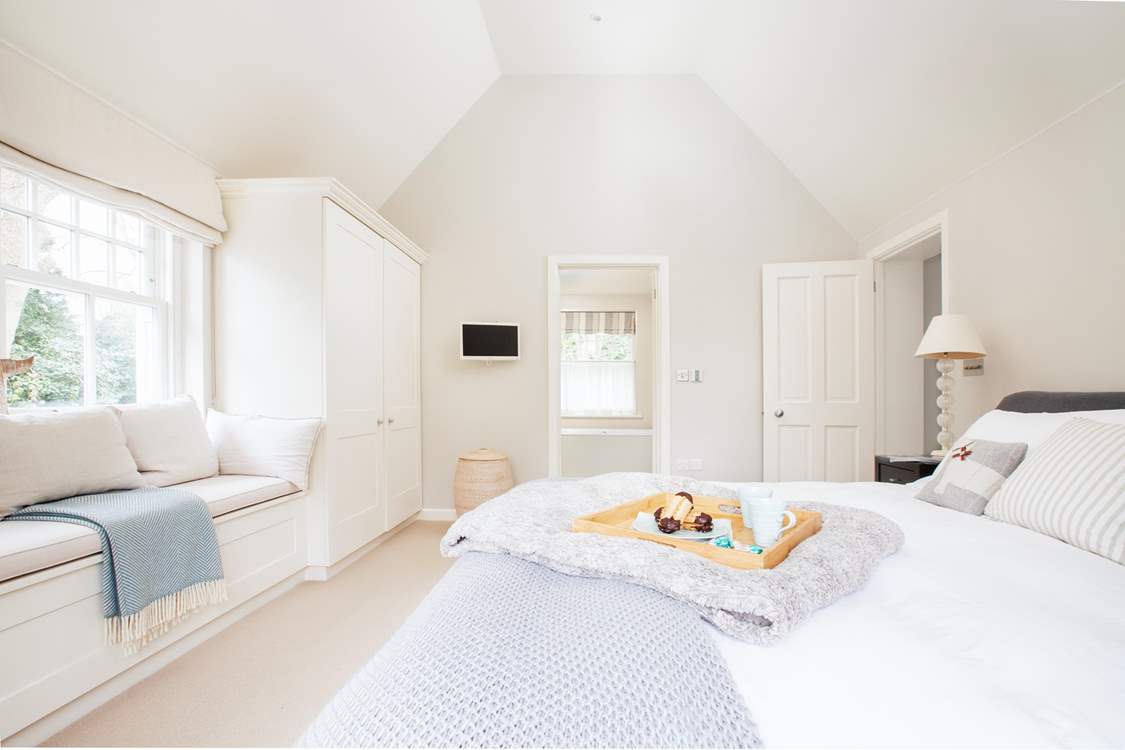 A view towards the en suite bathroom from the master bedroom.