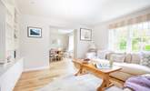 The first sitting room off the open plan kitchen/diner has a fitted bookshelf with flat screen TV, selection of books to read. There is also an assortment of games to play. - Thumbnail Image