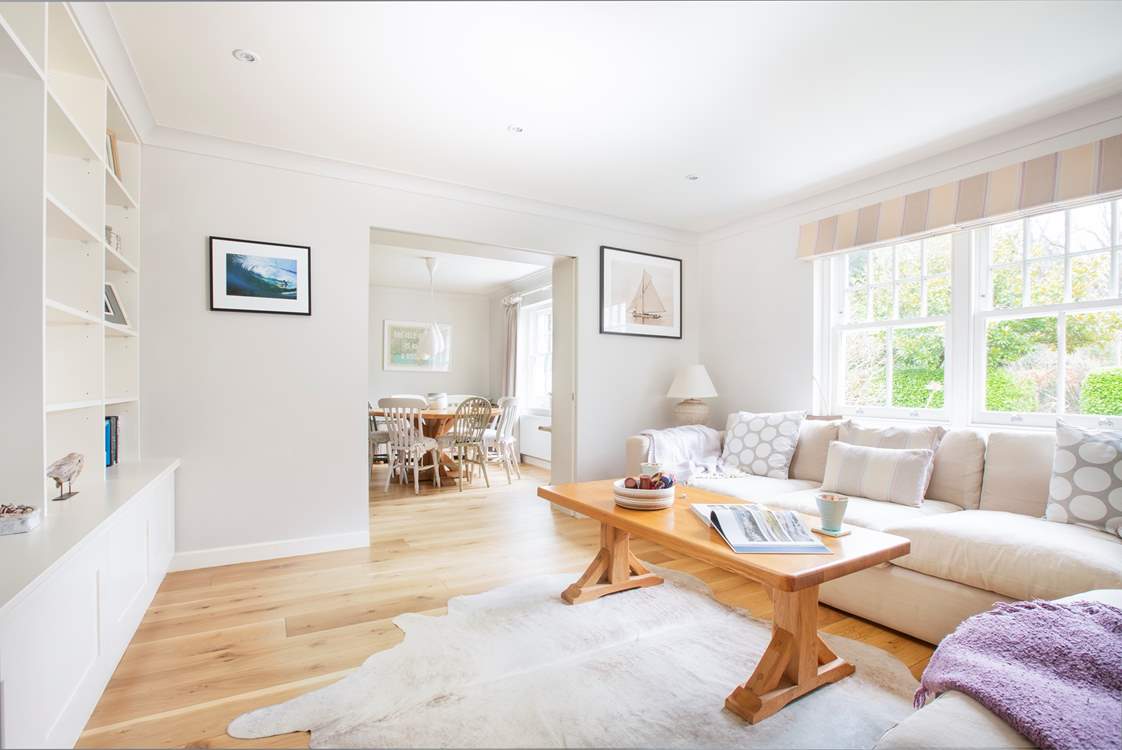 The first sitting room off the open plan kitchen/diner has a fitted bookshelf with flat screen TV and a selection of books to read. There is also an assortment of games to play.