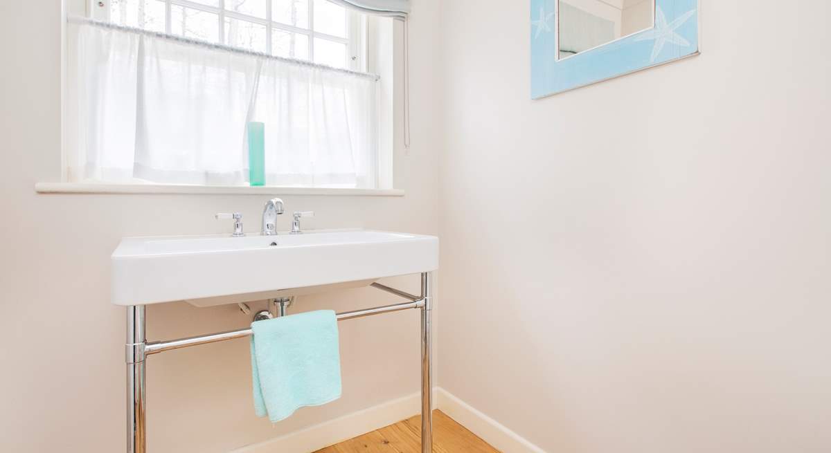 The modern downstairs cloakroom.