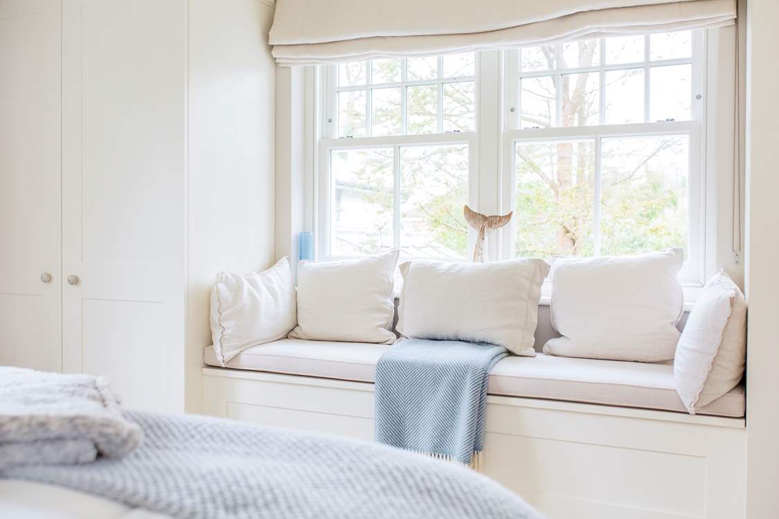 The charming window seat in the master bedroom.