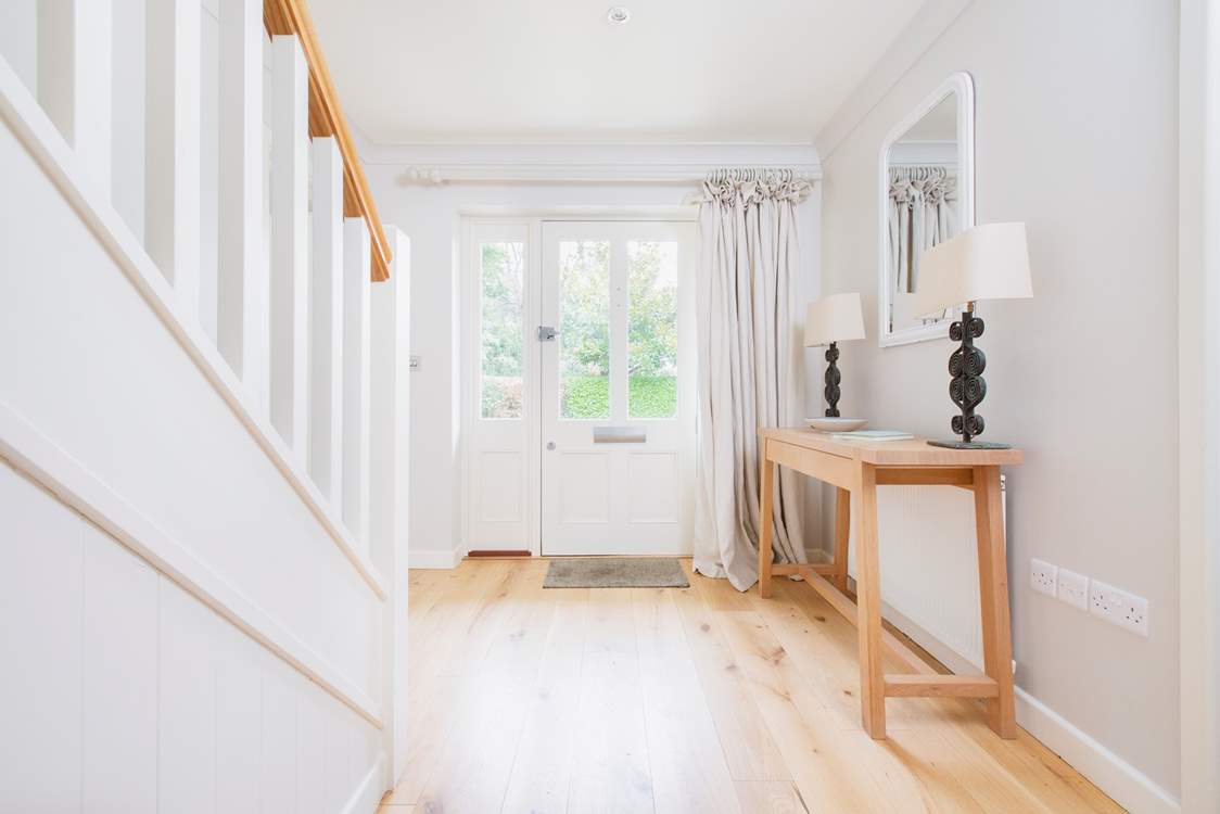 The light and spacious entrance hall at Pitt Corner.