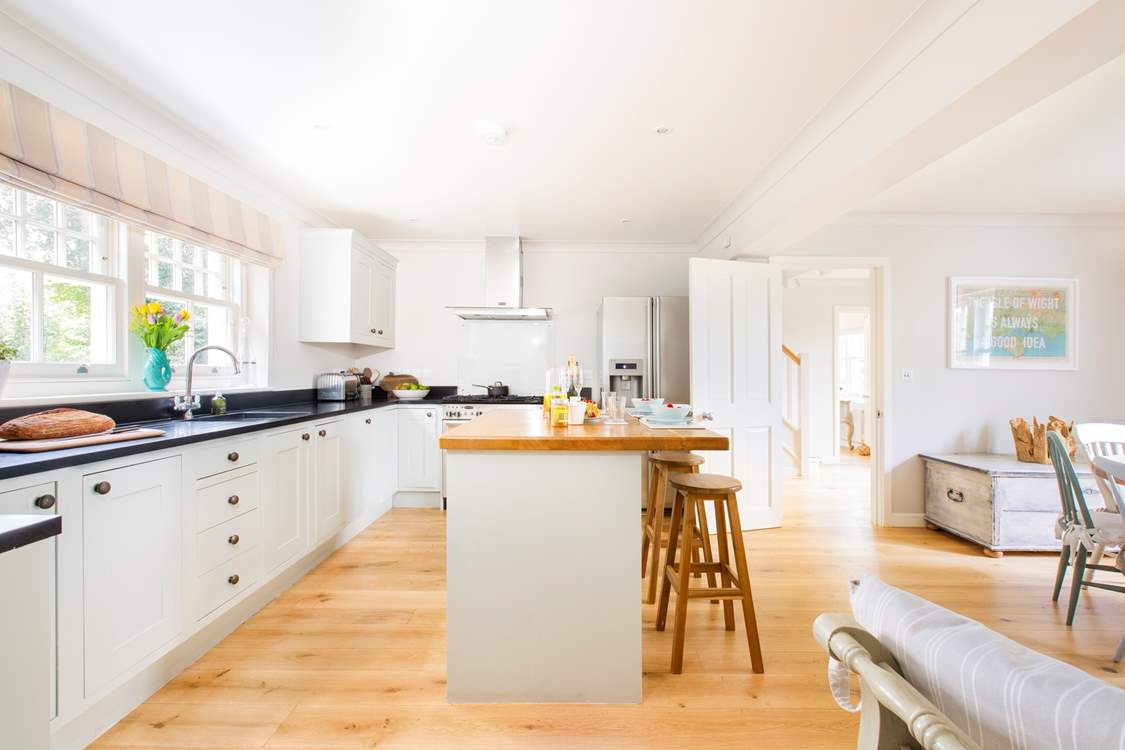 The open plan kitchen/dining-room is excellent for entertaining and spending time together.