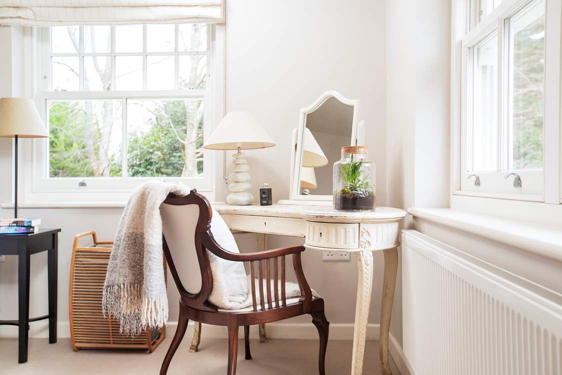 Comfortable dressing table to the corner of the second double bedroom.