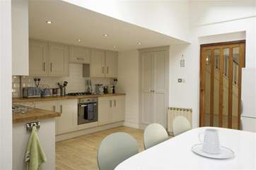 Sociable dining in the kitchen/diner.