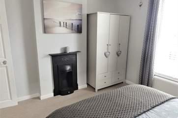 The double bedroom and the twin bedroom both have lovely ornamental fireplaces.