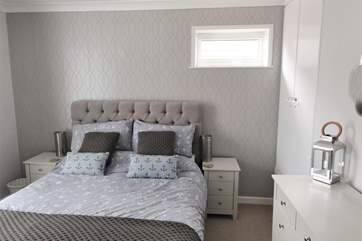 The pretty double bedroom with king-size bed.
