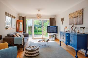 Enjoy the view out to the garden from the comfort of the sitting-room.