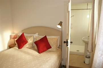 King-size bedroom with en suite shower-room.