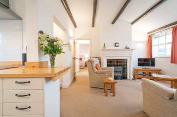 The lovely open plan living-room with kitchen and dining areas.