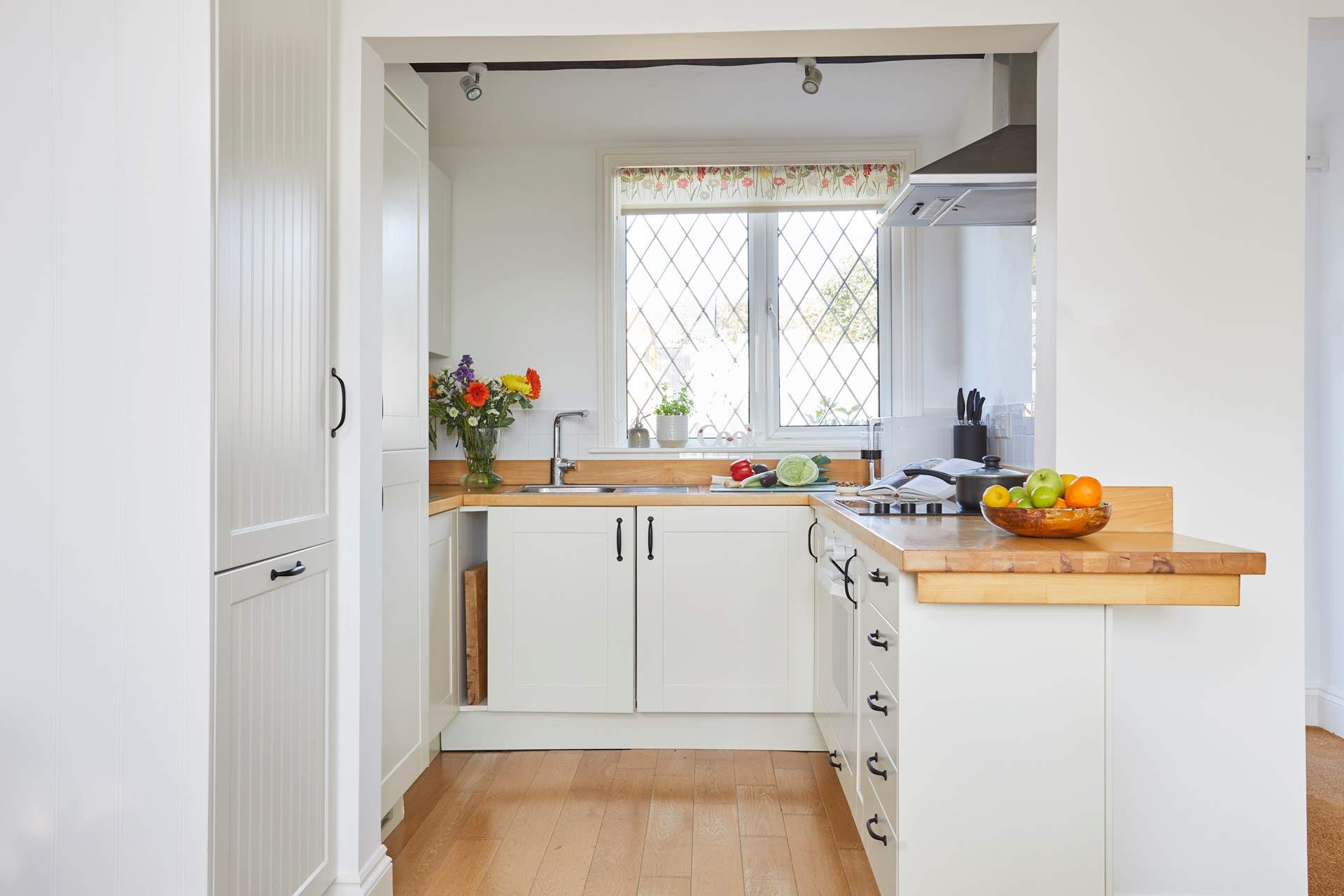 The kitchen is compact and has the necessary equipment for all your holiday meals. 