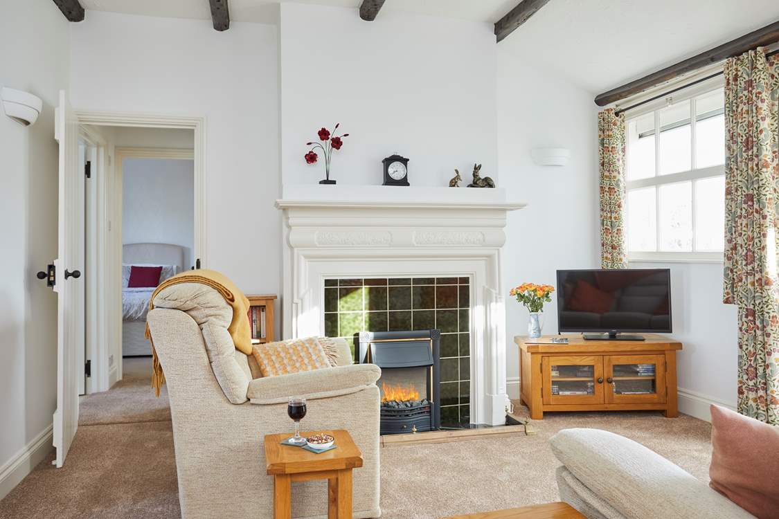 Enjoy an evening in watching TV with the warmth of the electric fire.