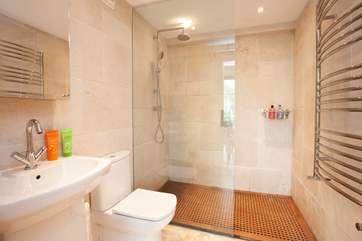 The modern shower-room on the ground floor is a useful bonus after a day at the beach.