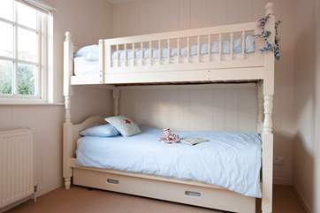 A bunk room that is sure to please children.