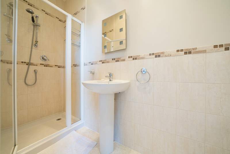 This en suite shower-room leads off the second bedroom. 