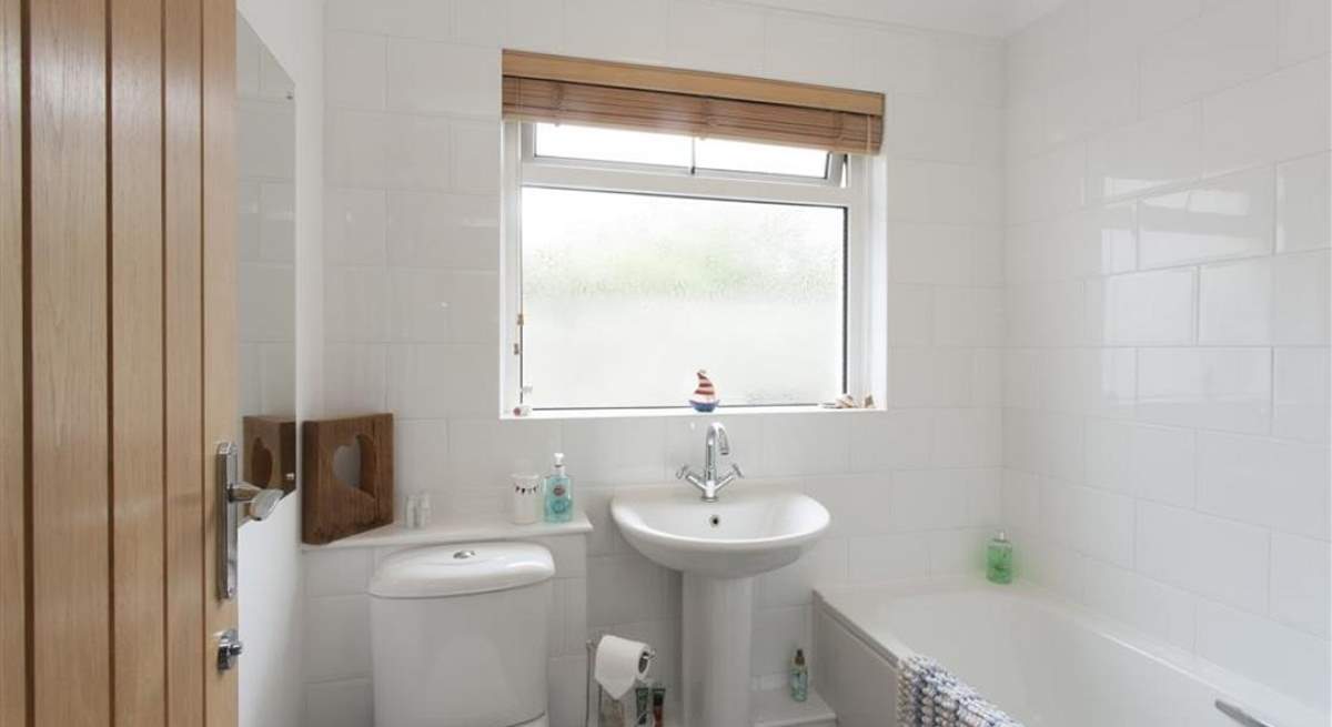 The family bathroom with fitted shower.