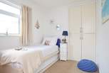 The second bedroom has a single bed with a pull out trundle bed to accommodate two people when required.
