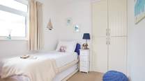 The second bedroom has a single bed with a pull out trundle bed to accommodate two people when required.