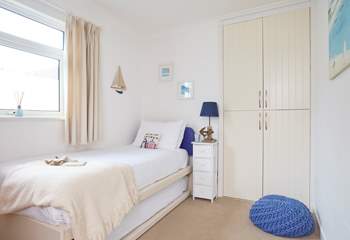 The second bedroom has a single bed with a pull out trundle bed to accommodate two people when required.