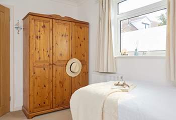 Another bright and airy bedroom with plenty of storage.