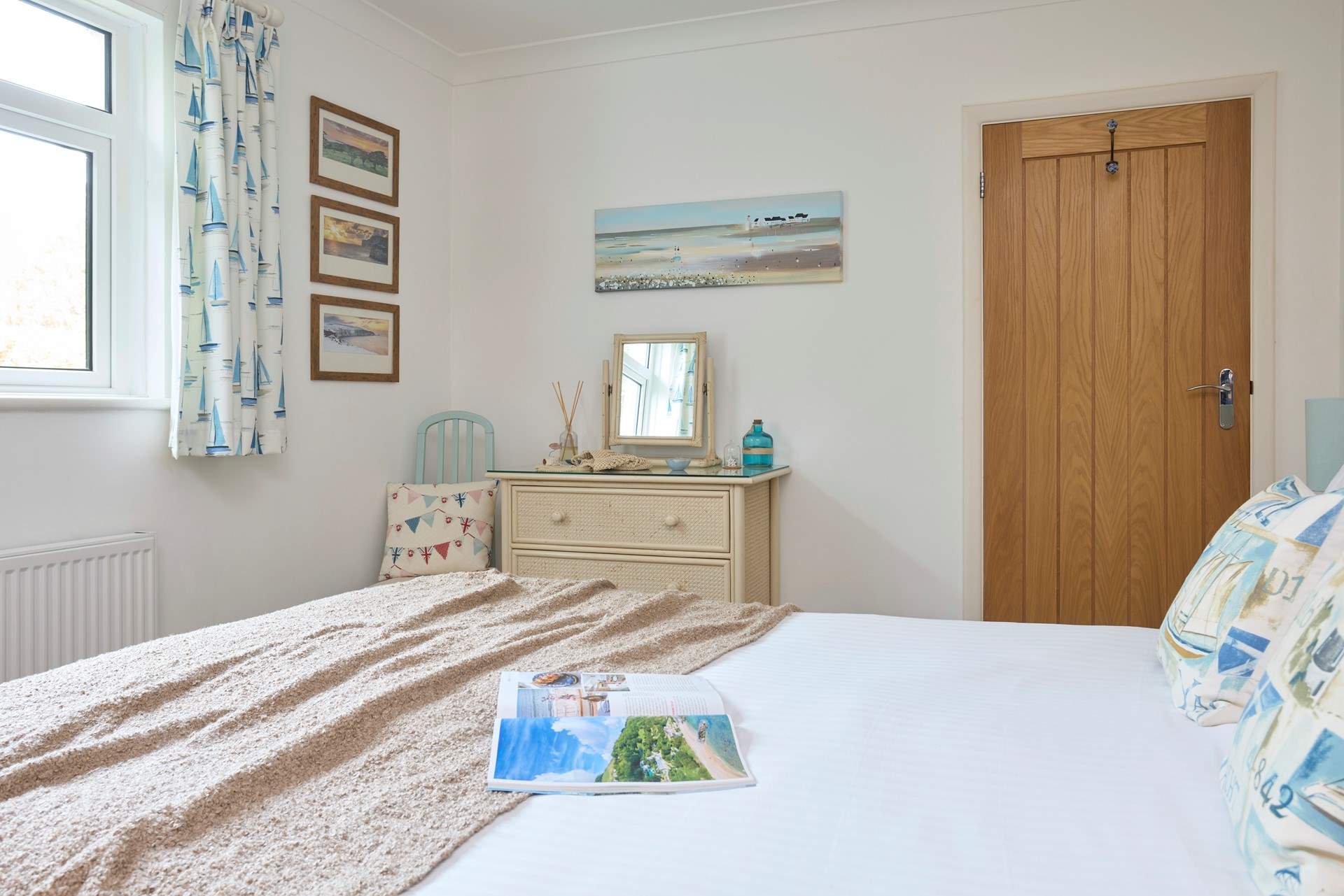 Bedroom 1 with king size bed is bright and airy. 