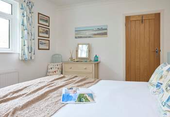 Bedroom 1 with king size bed is bright and airy. 