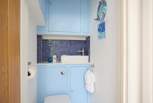 The property benefits from a separate cloakroom. 