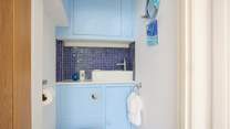 The property benefits from a separate cloakroom. 
